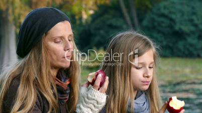 mother and daughter spending time together in a park