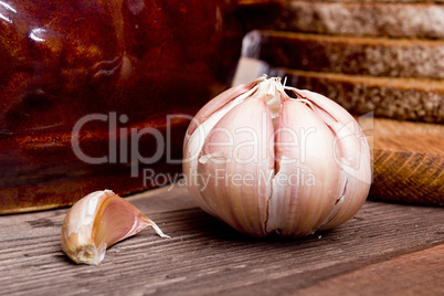 Head of garlic and a separate slice