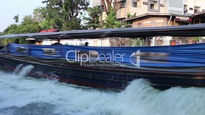 Dramatic waterway and fast speed riverboats in Bangkok, Thailand