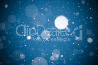 Winter background. falling snow on blue background