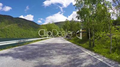 Driving a Car on a Road in Norway