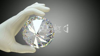 Hand in glove holding huge gemstone or diamond with alpha matte