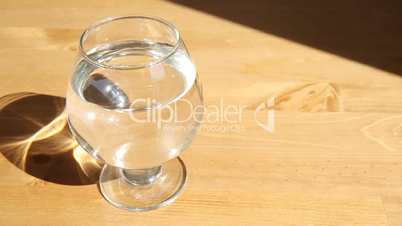 Glass of water slow slide
