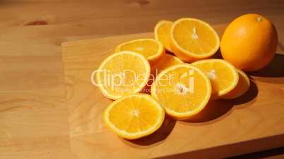Sliced oranges on a cutting board