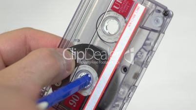 Audio cassette manually rewind