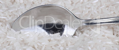 rice background and teaspoon