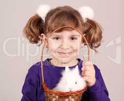 little girl with dwarf bunny pet