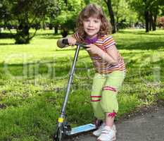 little girl with scooter