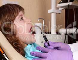 little girl patient to the dentist