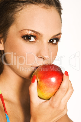 beautiful woman holding a apple