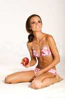 beautiful woman holding a apple