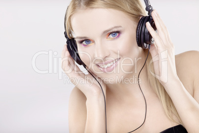 Beautiful girl is listen to the music