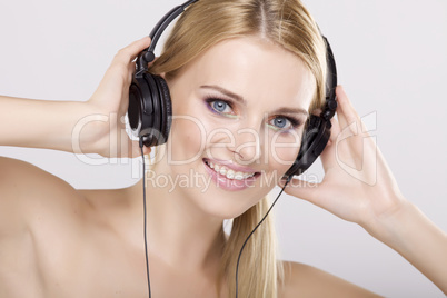 Beautiful girl is listen to the music