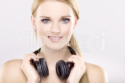 Beautiful girl is listen to the music