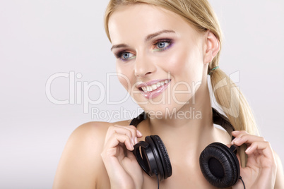 Beautiful girl is listen to the music