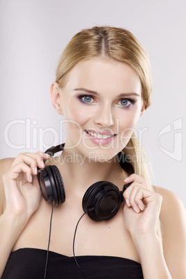 Beautiful girl is listen to the music