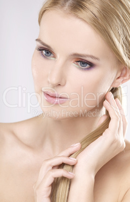 Young pretty woman with beautiful blond hairs Young pretty woman with beautiful blond hairs