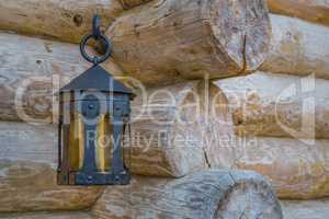 Old street light closeup on wooden wall