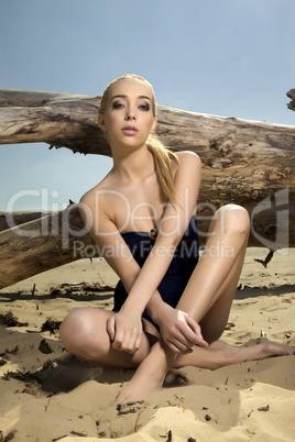 beautiful blonde woman in black swimwear
