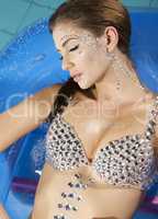 beautiful brunette in swimmingpool