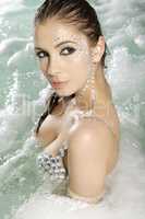 beautiful brunette in swimmingpool