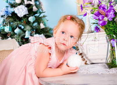 Girl decorate the Christmas tree