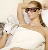Young woman receiving laser therapy