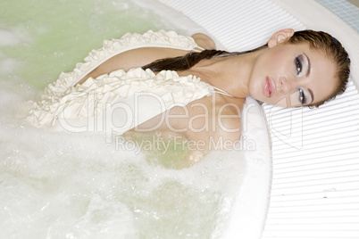 Young beautiful woman in jacuzzi