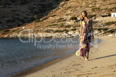 beautiful brunette woman in romantic summer dress