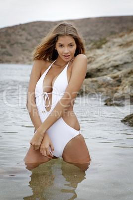 Brunette woman on the beach