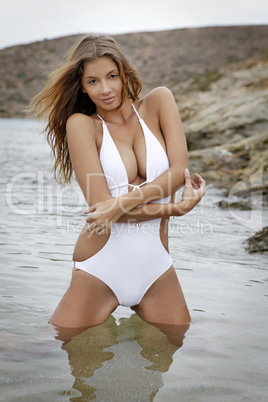 Brunette woman on the beach