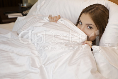 Woman lying in bed sleeping