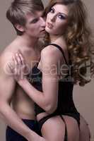 intimate young couple during foreplay