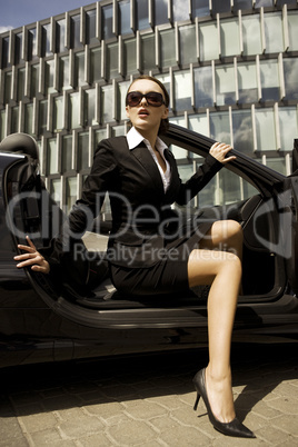 businesswoman in a cabrio