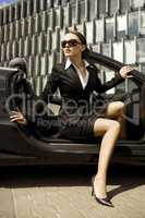 businesswoman in a cabrio
