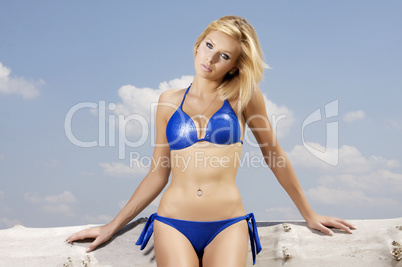 beautiful blonde woman in blue bikini