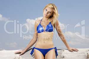 beautiful blonde woman in blue bikini