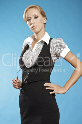 Businness woman portrait, holding a glasses.