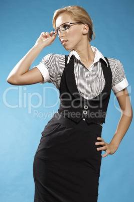 Businness woman portrait, holding a glasses.