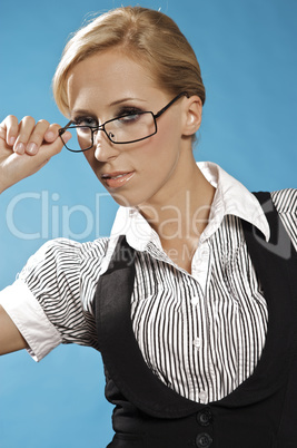 Businness woman portrait, holding a glasses.