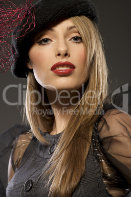 elegant fashionable woman in a hat