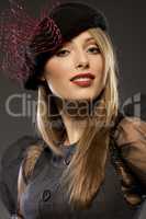 elegant fashionable woman in a hat