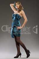 beautiful blond model in blue lucid dress