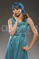 beautiful blond model in blue lucid dress