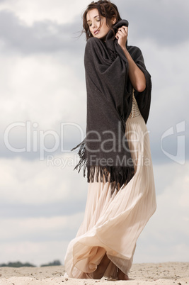 attractive and sensuality woman dancing in the desert