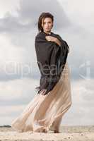 attractive and sensuality woman dancing in the desert