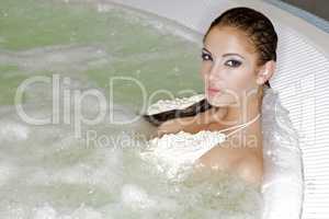 Young beautiful woman in jacuzzi