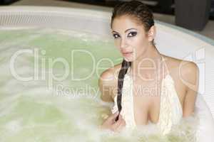 Young beautiful woman in jacuzzi