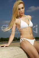 beautiful blonde woman in white bikini