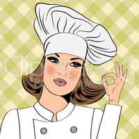 Sexy chef woman in uniform  gesturing ok sign with her hand